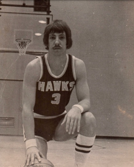 A person in a basketball uniform

Description automatically generated with medium confidence
